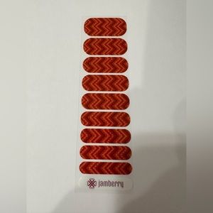 Jamberry Nail Wraps: red, orange, burgundy.